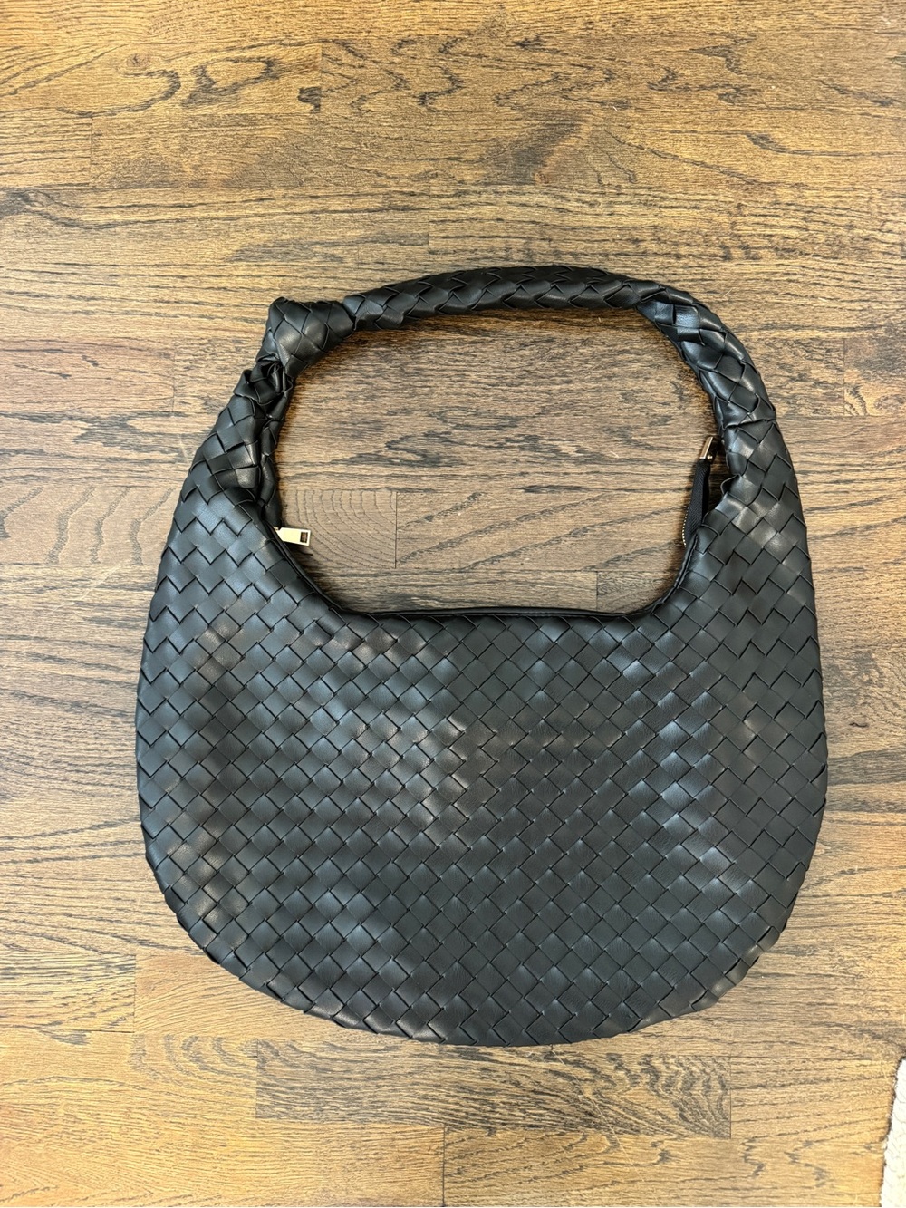 LIKE NEW - Anthropologie Black woven leather handbag with gold hardware.